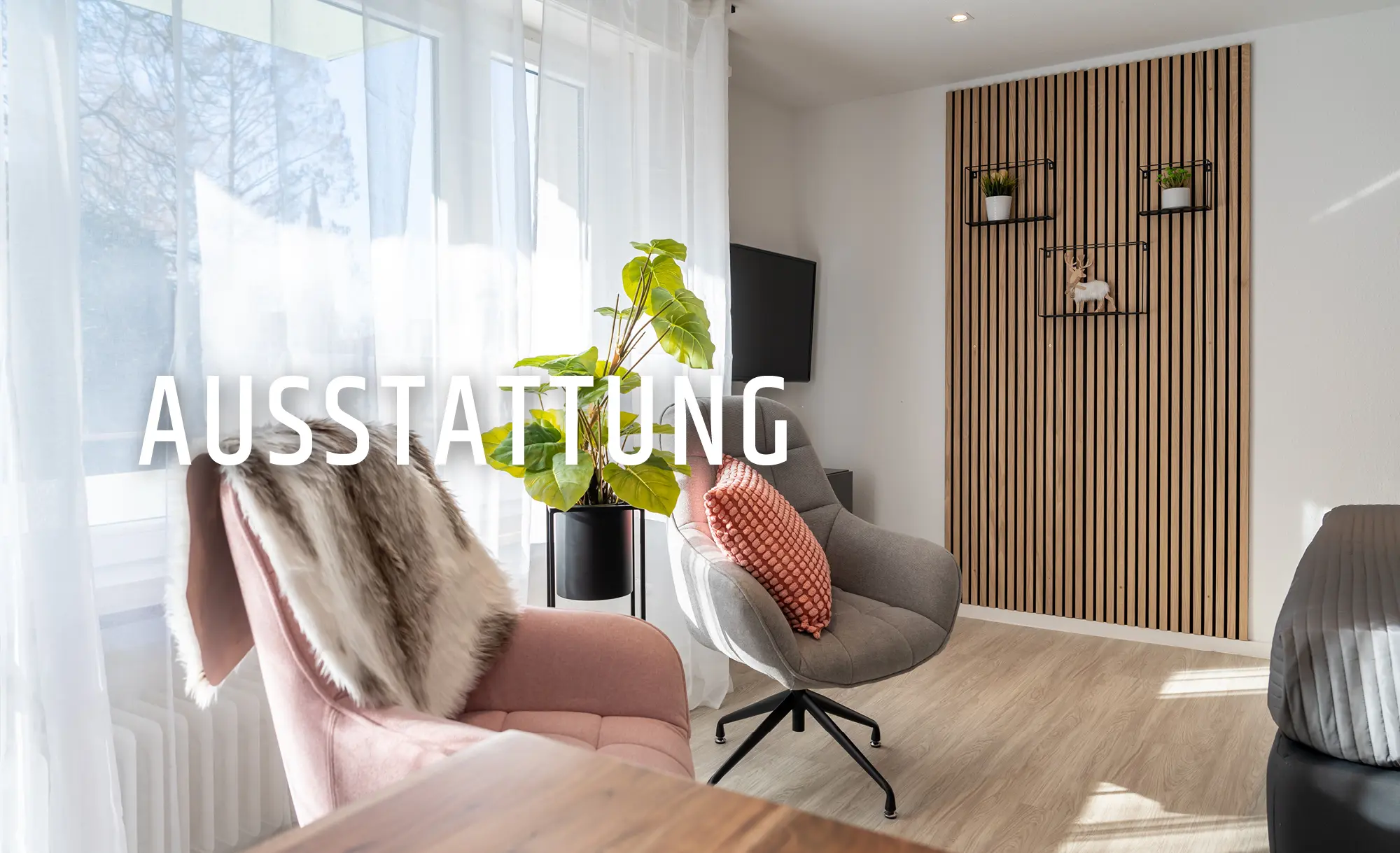 A modern, cozy room with two comfortable armchairs